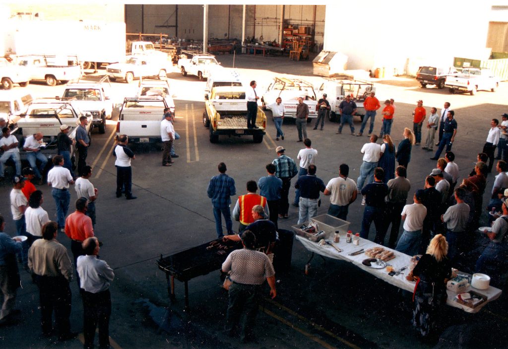 Historical photo of a meeting in Mark III's yard from the 1980's.