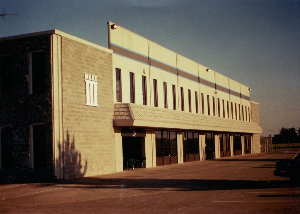 Sepia tone historical photo of the exterior of Mark III Constructions Sacramento headquarters.